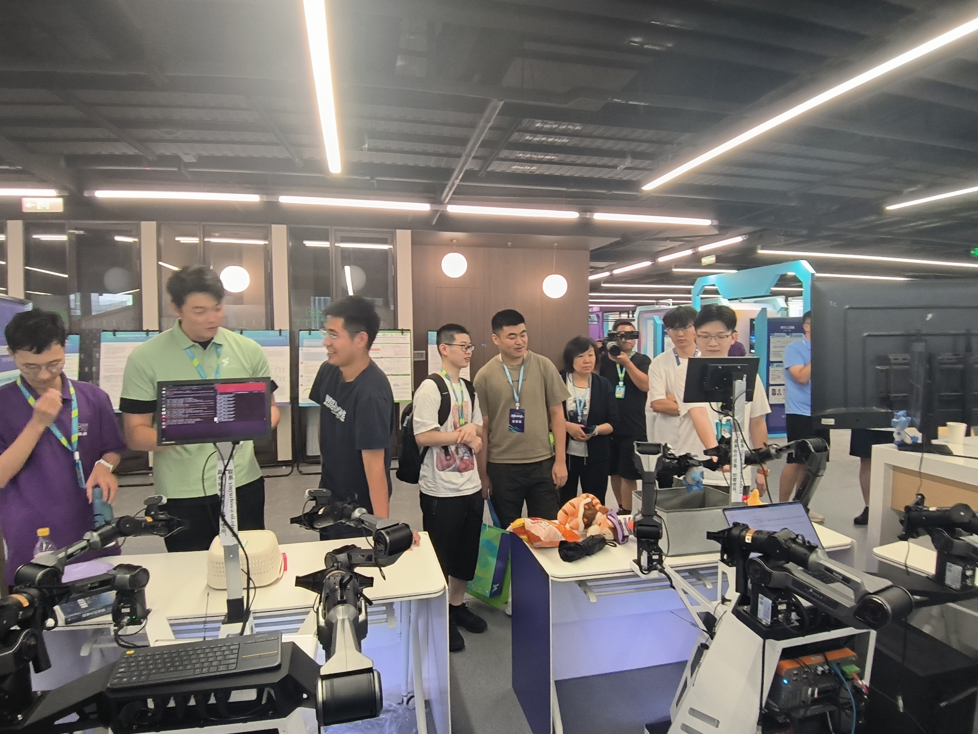 We are demonstrating two tasks (Search for SII Doll & Pick and Place with Emergency) live and introducing visitors to the applied technologies: End-to-end Causal Reasoning and Closed-loop Interactive Learning.